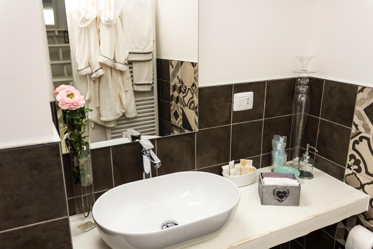 La Rosa Del Corso Apartment ฟาซาโน ภายนอก รูปภาพ